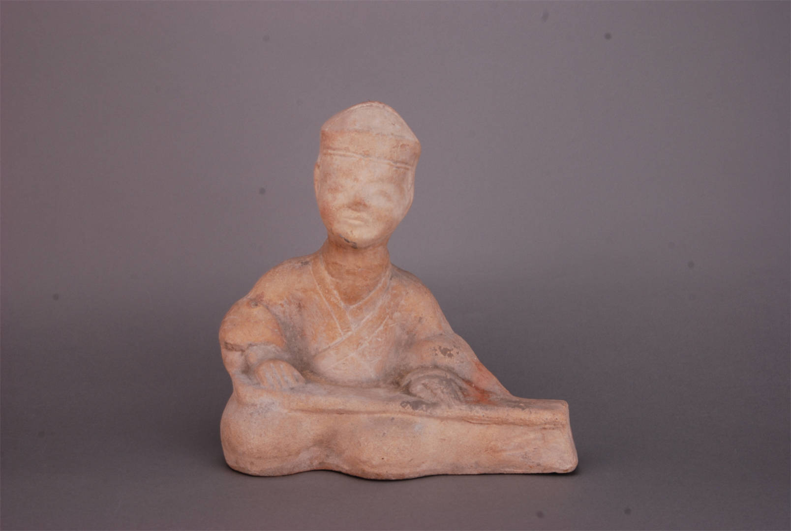 Terracotta Zither Player Figurine in Eastern Han Dynasty 